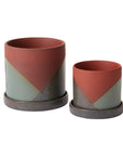 El Cerro colour block planters in rust and sage with saucers