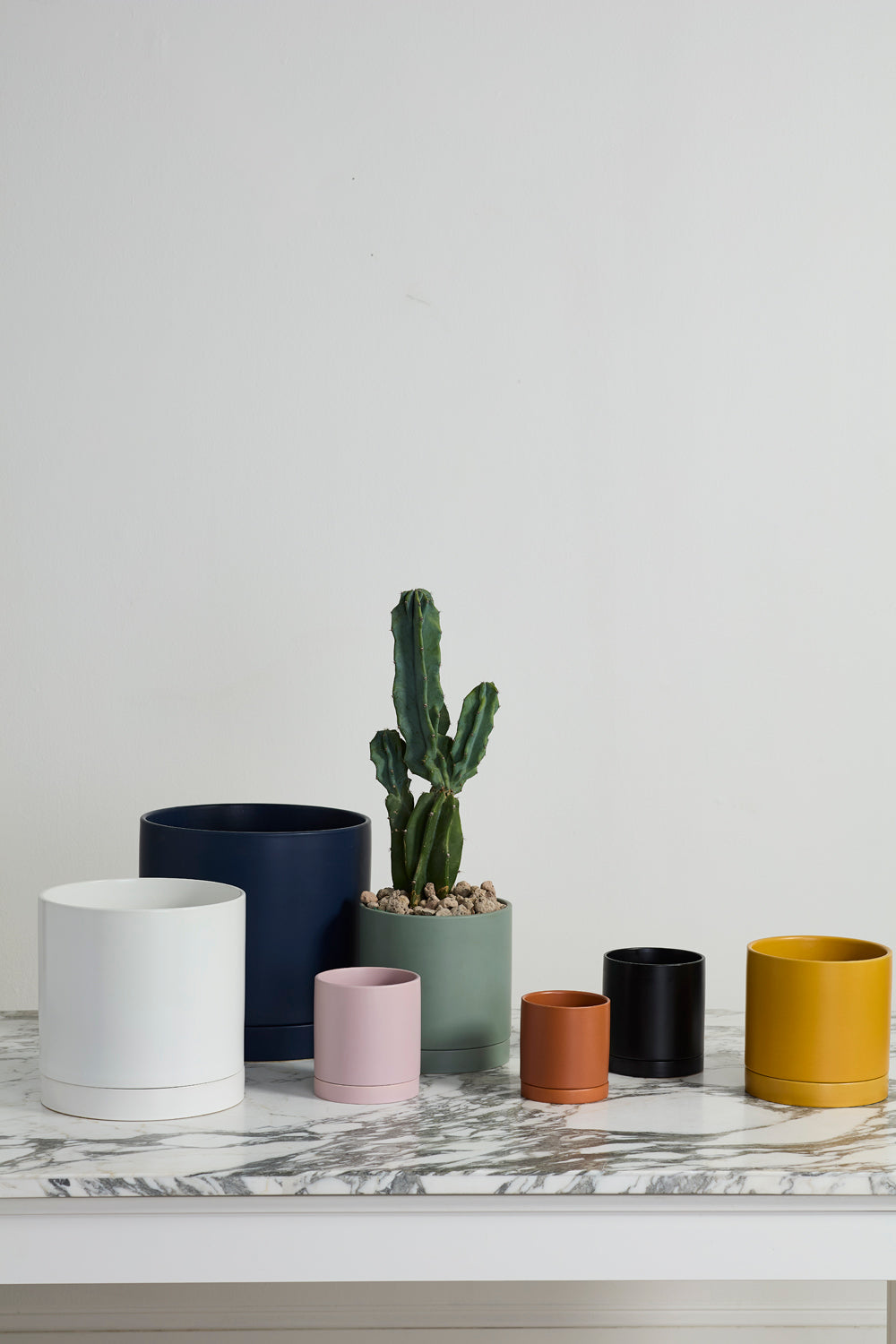 Romey planter styled on a shelf