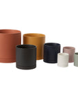 Romey ceramic planters grouped in several colors